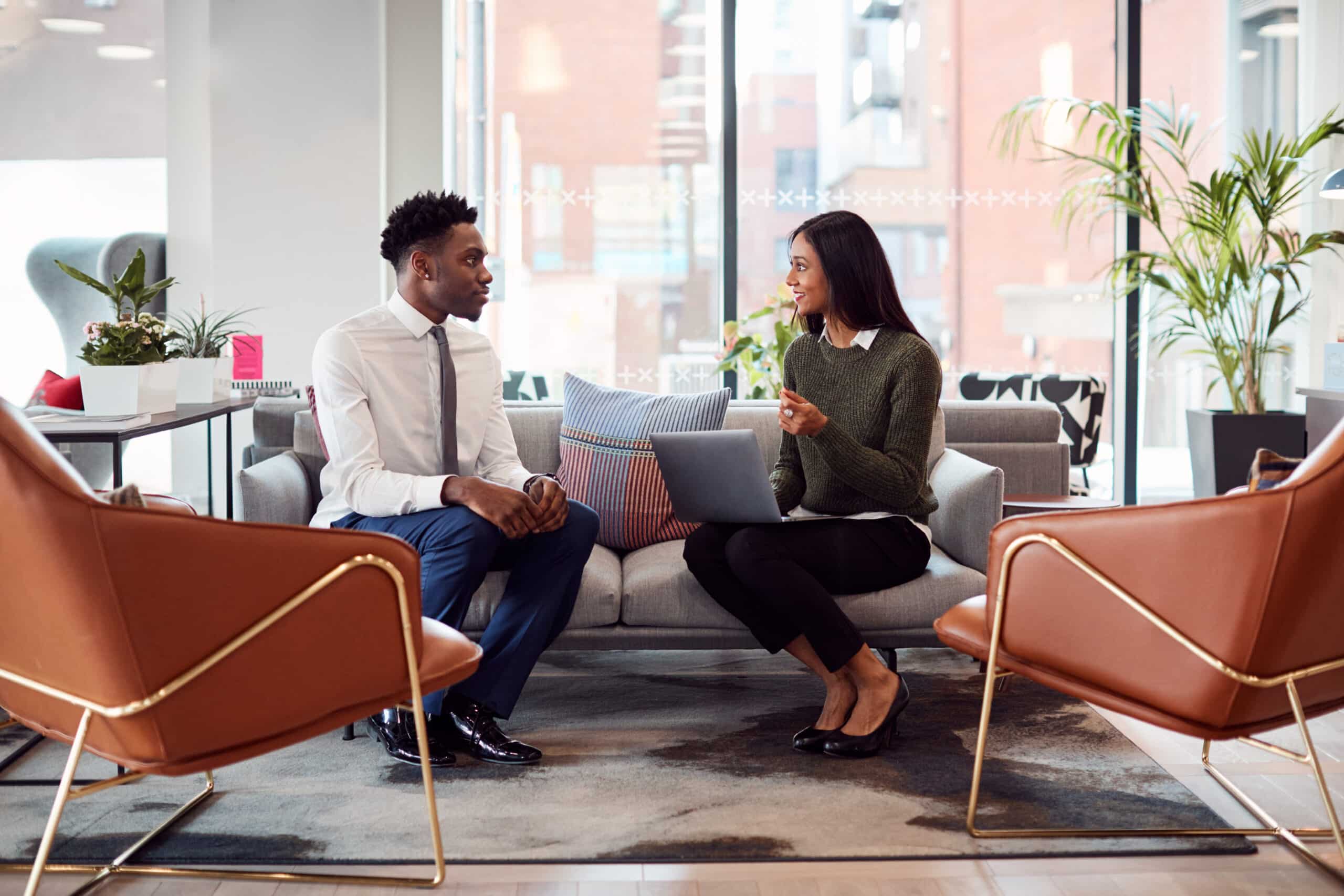 Businesswoman Interviewing Male Job Candidate